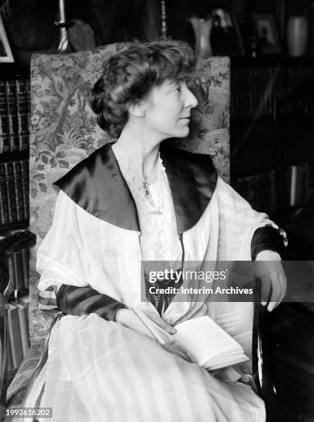 Seated profile portrait of American politician and feminist Jeannette Rankin who served as Congresswoman for the state of Montana, February 1917.