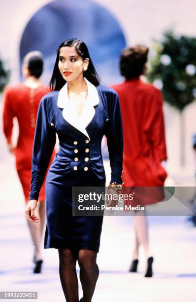 Model Anna Bayle walks in the Chanel Spring 1986 Couture Runway Show on January 28 in Paris, France.