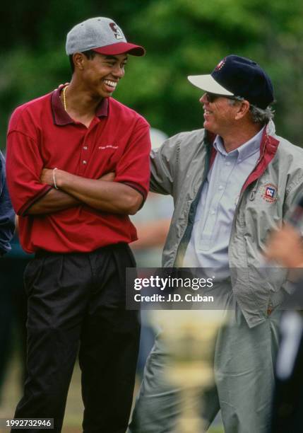 Tiger Woods from the United States in conversation with golf coach Butch Harmon during the United States Amateur Championship golf tournament on 27th...