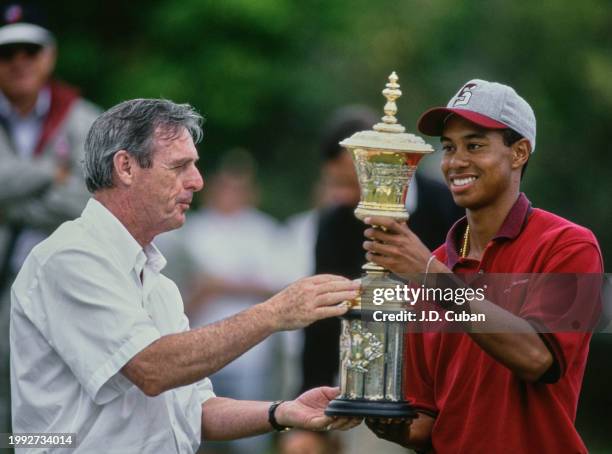 John "Reg" Murphy, President of the United States Golf Association presents Tiger Woods from the United States with the Havemeyer Trophy after...