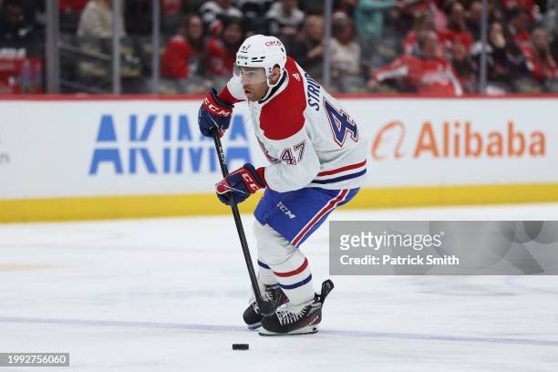 Jayden Struble of the Montreal Canadiens skates with the puck against the Washington Capitals at Capital One Arena on February 06, 2024 in...