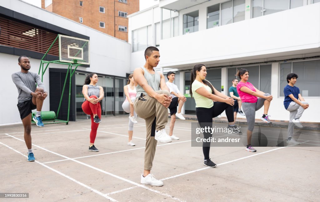 Group of university students in physical education class