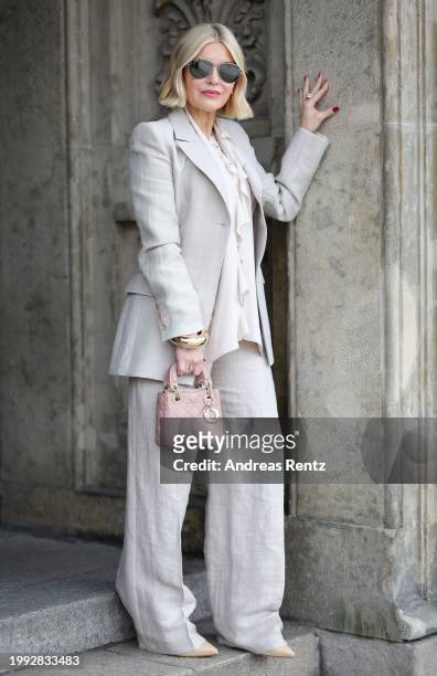 Petra Dieners wears a full look by SLY010, silver shoes by MiuMiu and a bag by Dior during the Berlin Fashion Week AW24 on February 06, 2024 in...