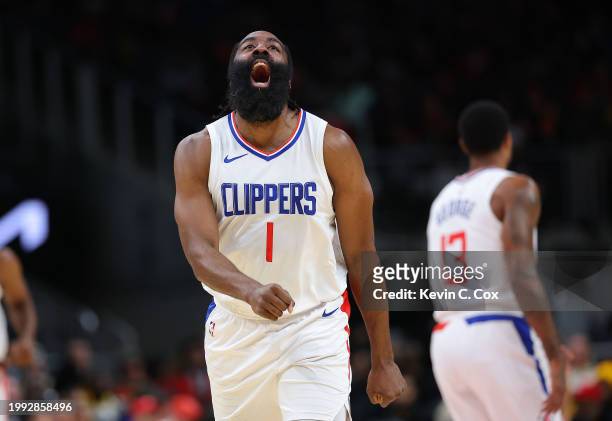 James Harden of the LA Clippers reacts after hitting a three-point basket against the Atlanta Hawks during the first quarter at State Farm Arena on...