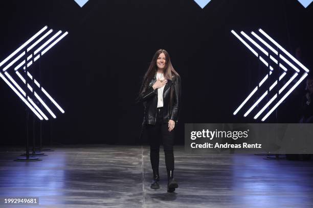 Designer Rebekka Ruetz comes out on the runway to greet the audience after the Rebekka Ruetz Runway Show as part of the W.E4. Fashion Day during...