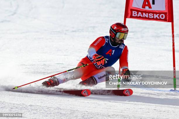 Switzerland's Loic Meillard competes in the first run of the Men's Giant Slalom event during the FIS Alpine Ski World Cup in Bansko, on February 10,...