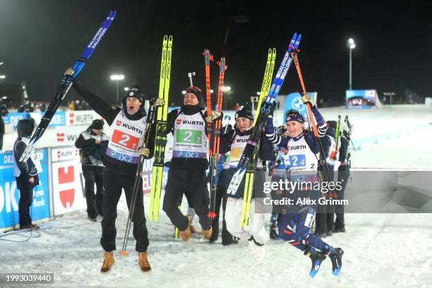 Gold medalists Eric Perrot, Quentin Fillon Maillet, Justine Braisaz-Bouchet and Julia Simon of Team France celebrate winning the Mixed Relay of the...