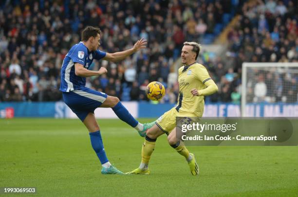 Preston North End's Liam Millar battles with Cardiff City's Perry Ng during the Sky Bet Championship match between Cardiff City and Preston North End...