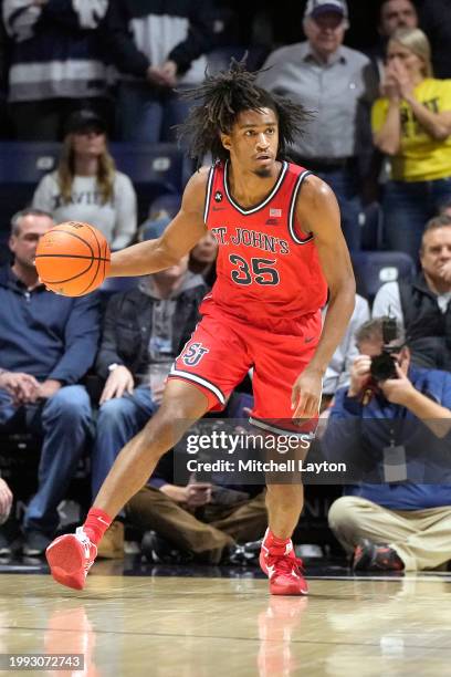Glenn Taylor Jr. #35 of the St. John's Red Storm dribbles the ball during a college basketball game against the Xavier Musketeers at the Cintas...