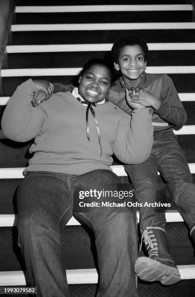 American actress Martine Allard and American actor Alfonso Ribeiro posing on a flight of stairs in New York City, New York, 19th January 1984. Shot...