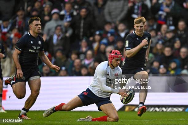 France's wing Louis Bielle-Biarrey scores a try during the Six Nations international rugby union match between Scotland and France at Murrayfield...