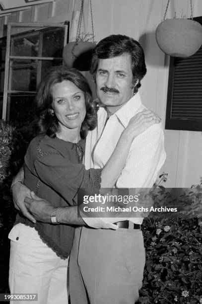 American actress Nancy Dow embraces her husband, Greek-born American actor John Aniston at home in the Sherman Oaks neighbourhood of Los Angeles,...