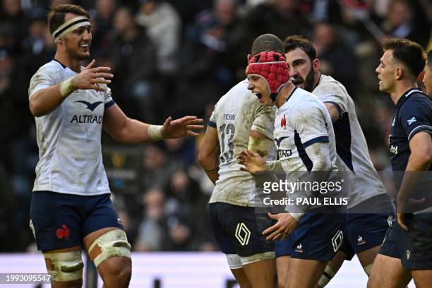 France's wing Louis Bielle-Biarrey celebrates after scoring a try during the Six Nations international rugby union match between Scotland and France...