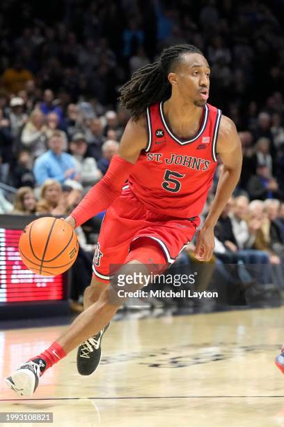 Daniss Jenkins of the St. John's Red Storm dribbles the ball during a college basketball game against the Xavier Musketeers at the Cintas Center on...