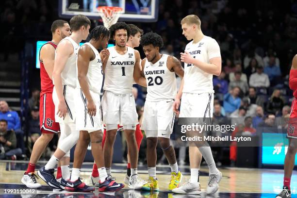 The Xavier Musketeers huddle during a college basketball game against the St. John's Red Storm at the Cintas Center on January 31, 2024 in...