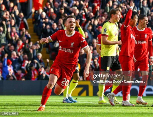 Liverpool's Diogo Jota celebrates scoring the opening goal during the Premier League match between Liverpool FC and Burnley FC at Anfield on February...