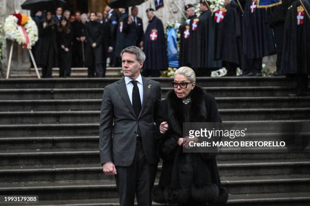 Princess Marina Doria of Savoy , widow of Vittorio Emanuele of Savoy, and Prince Emanuele Filiberto of Savoy exit the cathedral following the funeral...