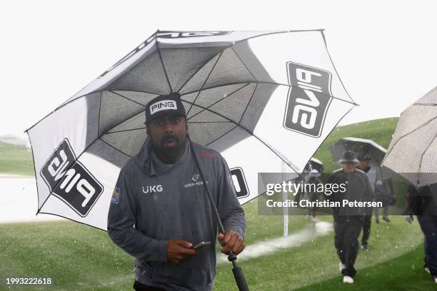 Sahith Theegala Sahith Theegala reacts as he walks off the 18th hole during a weather delay at the Pro-am to the WM Phoenix Open at TPC Scottsdale on...