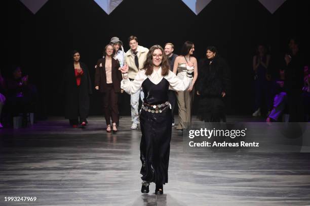 Winner of the Sustainabilty Contest is seen on the runway during the Marcel Ostertag Runway Show as part of the W.E4. Fashion Day during Berlin...