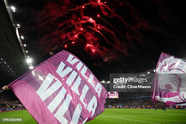 General view as a flag-bearer waves an Aston Villa flag during a pyrotechnics show prior to kick-off ahead of the Emirates FA Cup Fourth Round Replay...