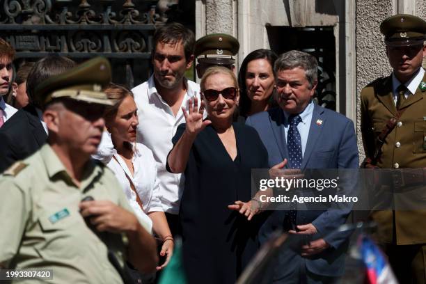 Cecilia Morel, wife of former president of Chile Sebastián Piñera, waves to supporters who wait outside the former National Congress for the wake on...