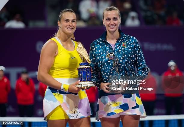 Champion Aryna Sabalenka of Belarus and runner-up Petra Kvitova of the Czech Republic during the trophy ceremony after the final of the 2020 Qatar...