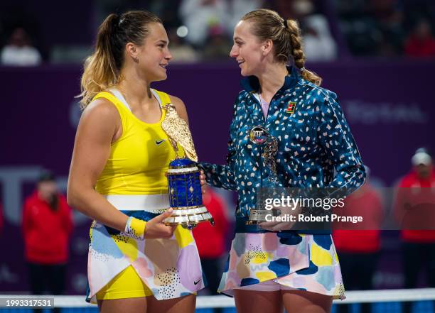 Champion Aryna Sabalenka of Belarus and runner-up Petra Kvitova of the Czech Republic during the trophy ceremony after the final of the 2020 Qatar...