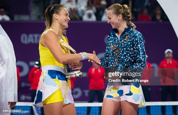 Champion Aryna Sabalenka of Belarus and runner-up Petra Kvitova of the Czech Republic during the trophy ceremony after the final of the 2020 Qatar...