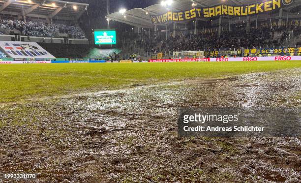 Detailed view of the waterlogged pitch as the match is postponed prior to the scheduled DFB cup Quarterfinal match between 1. FC Saarbrücken and...