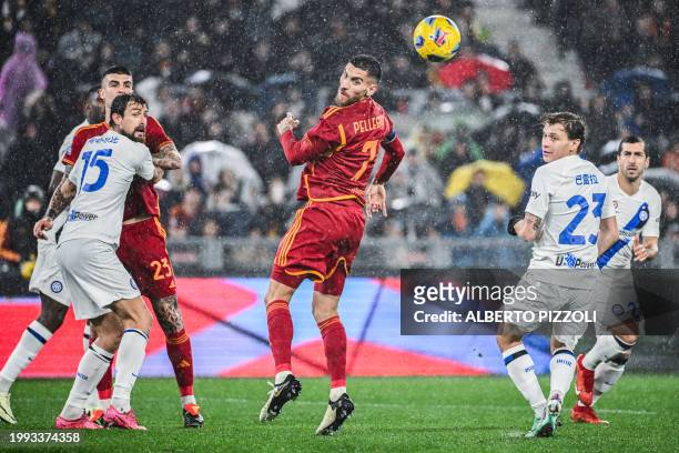 Roma's Italian midfielder Lorenzo Pellegrini goes for the ball during the Italian Serie A football match between AS Roma and Inter Milan at the...