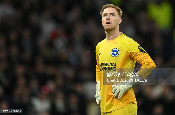 Brighton's English goalkeeper Jason Steele reacts after conceding a second goal during the English Premier League football match between Tottenham...