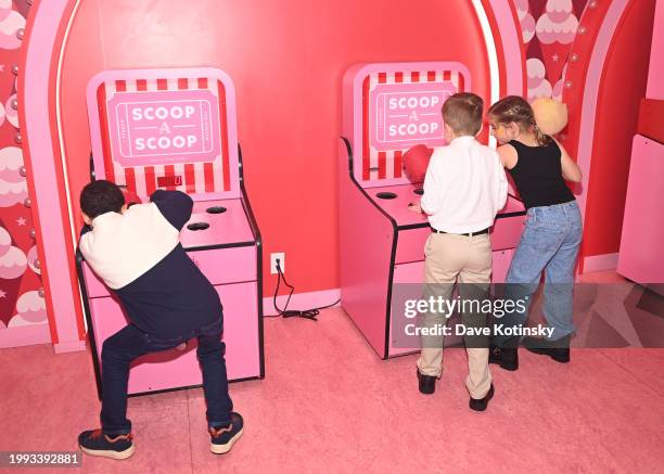 Guests enjoy Scoop a Scoop during the God's Love We Deliver Young Hearts Friends Fest: Valentine's Party at the Museum of Ice Cream on February 06,...