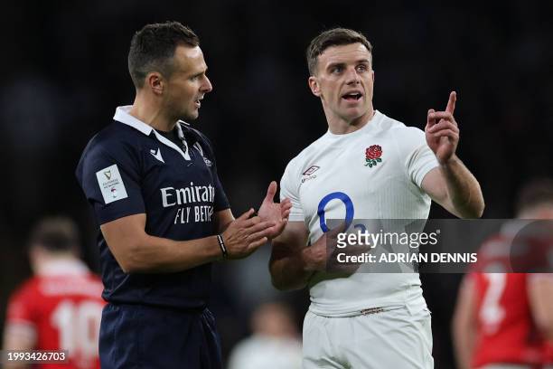 England's fly-half George Ford remonstrates with Referee James Doleman after Wales' during his attempted try conversion during the Six Nations...