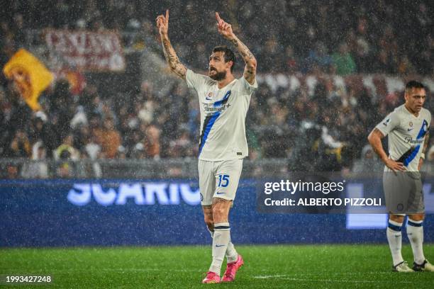 Inter Milan's Italian defender Francesco Acerbi celebrates after opening the scoring during the Italian Serie A football match between AS Roma and...