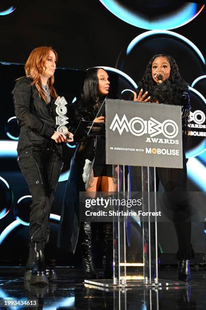 Siobhán Donaghy, Mutya Buena and Keisha Buchanan of the Sugababes on stage to accept the Mobo impact award during the 2024 MOBO Awards ceremony at...