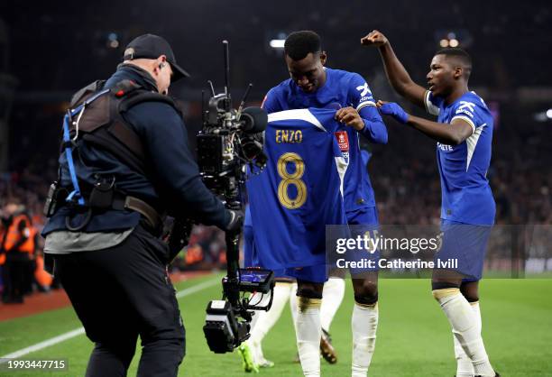 Nicolas Jackson and Moises Caicedo of Chelsea celebrate as Enzo Fernandez of Chelsea scores his team's third goal from a direct free-kick during the...