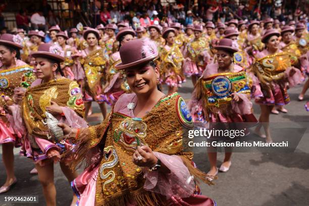 Women wearing traditional clothes dance Morenada during the 2024 Oruro Carnival on February 10, 2024 in Oruro, Bolivia. Listed as one of the...