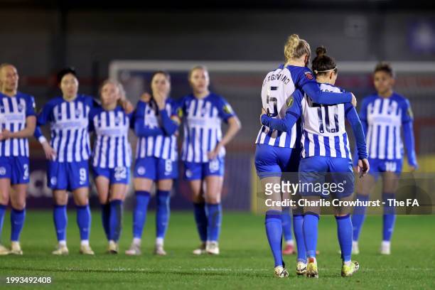 Julia Zigiotti Olme of Brighton & Hove Albion is consoled by teammate Guro Bergsvand after missing the team's fourth penalty in the penalty shootout...