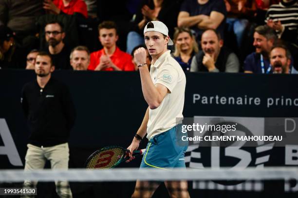 France's Ugo Humbert reacts after winning a point against Poland's Hubert Hurkacz during their men's semi-final singles tennis match at the ATP Open...