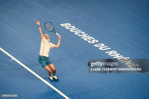 France's Ugo Humbert serves to Poland's Hubert Hurkacz during their men's semi-final singles tennis match at the ATP Open 13 in Marseille, southern...