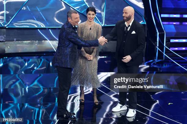Amadeus, Giorgia and John Travolta attend the 74th Sanremo Music Festival 2024 at Teatro Ariston on February 07, 2024 in Sanremo, Italy.