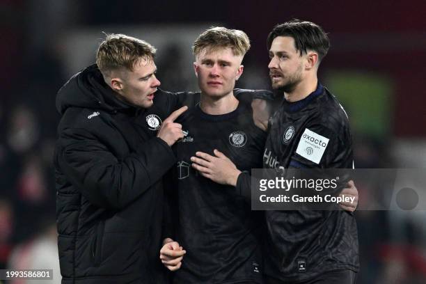 Sam Bell of Bristol City is consoled by Tommy Conway and Harry Cornick of Bristol City after missing his penalty in the penalty shoot out during the...