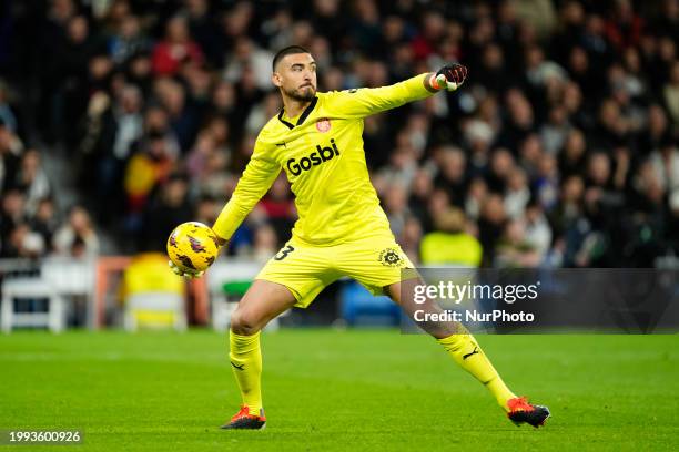 Paulo Gazzaniga goalkeeper of Girona and Argentina does passed during the LaLiga EA Sports match between Real Madrid CF and Girona FC at Estadio...