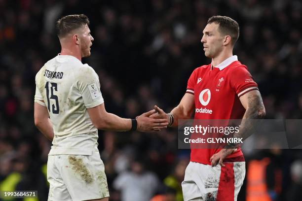 England's full-back Freddie Steward shakes hands with Wales' centre George North after the Six Nations international rugby union match between...