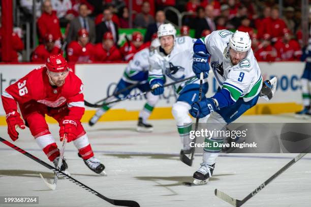 Miller of the Vancouver Canucks shoots the puck against the Detroit Red Wings during the second period at Little Caesars Arena on February 10, 2024...