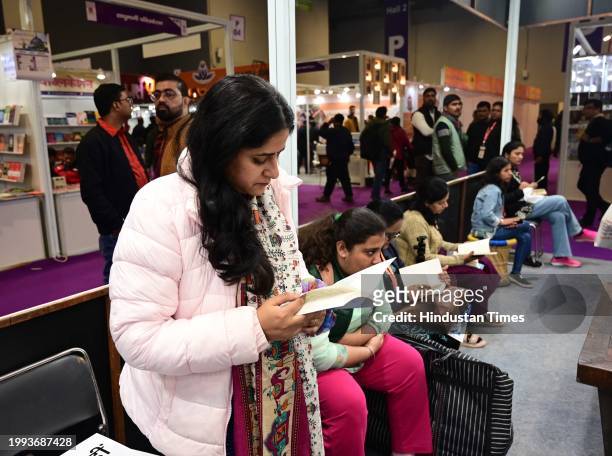 People reads or take a look at the books during World Book Fair at Pragati Maidan , on February 10, 2024 in New Delhi, India. This edition of the...