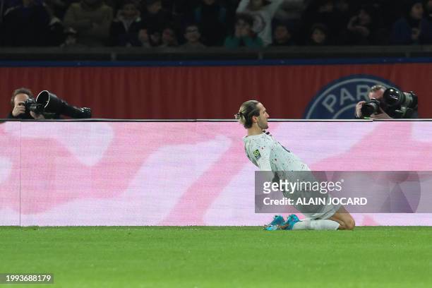 Lille's Turkish forward Yusuf Yazici celebrates after scoring Lille's first goal during the French L1 football match between Paris Saint-Germain and...