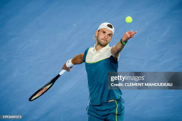 Bulgaria's Grigor Dimitrov serves to Russia's Karen Khachanov during their men's semi-final singles tennis match at the ATP Open 13 in Marseille,...