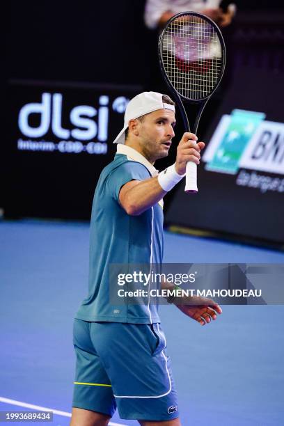 Bulgaria's Grigor Dimitrov reacts after winning his men's semi-final singles tennis match against Russia's Karen Khachanov at the ATP Open 13 in...