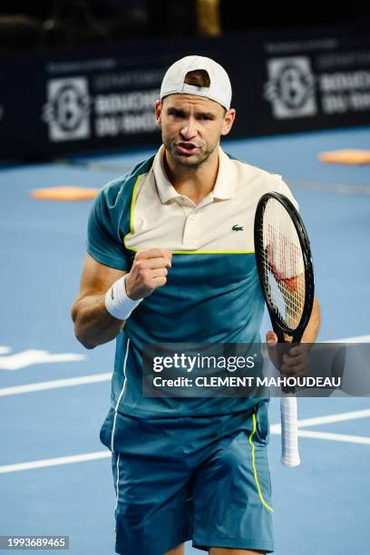 Bulgaria's Grigor Dimitrov reacts after a point against Russia's Karen Khachanov during their men's semi-final singles tennis match at the ATP Open...